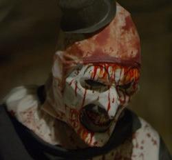屏幕截图显示残缺的小丑角色来自:吓坏了，在恐怖类型的电影